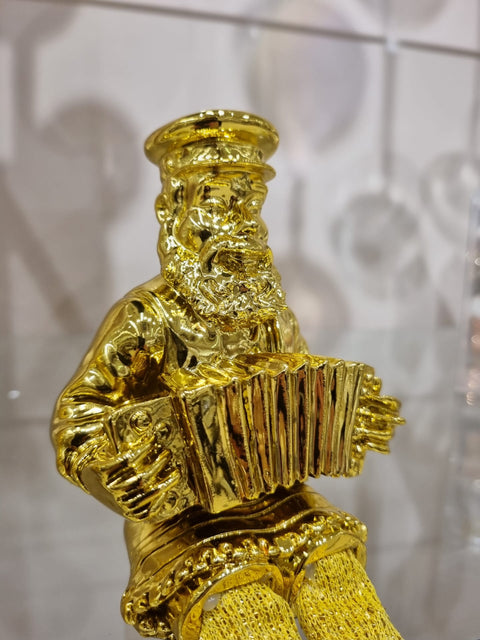 Gold Figurine - Accordeon Player