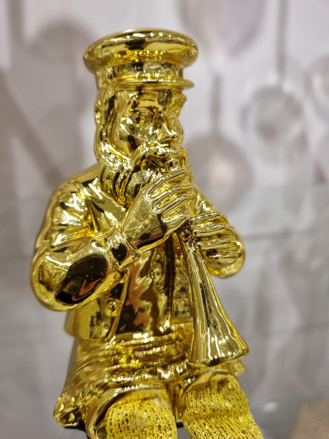 Gold Figurine - Trumpet Player